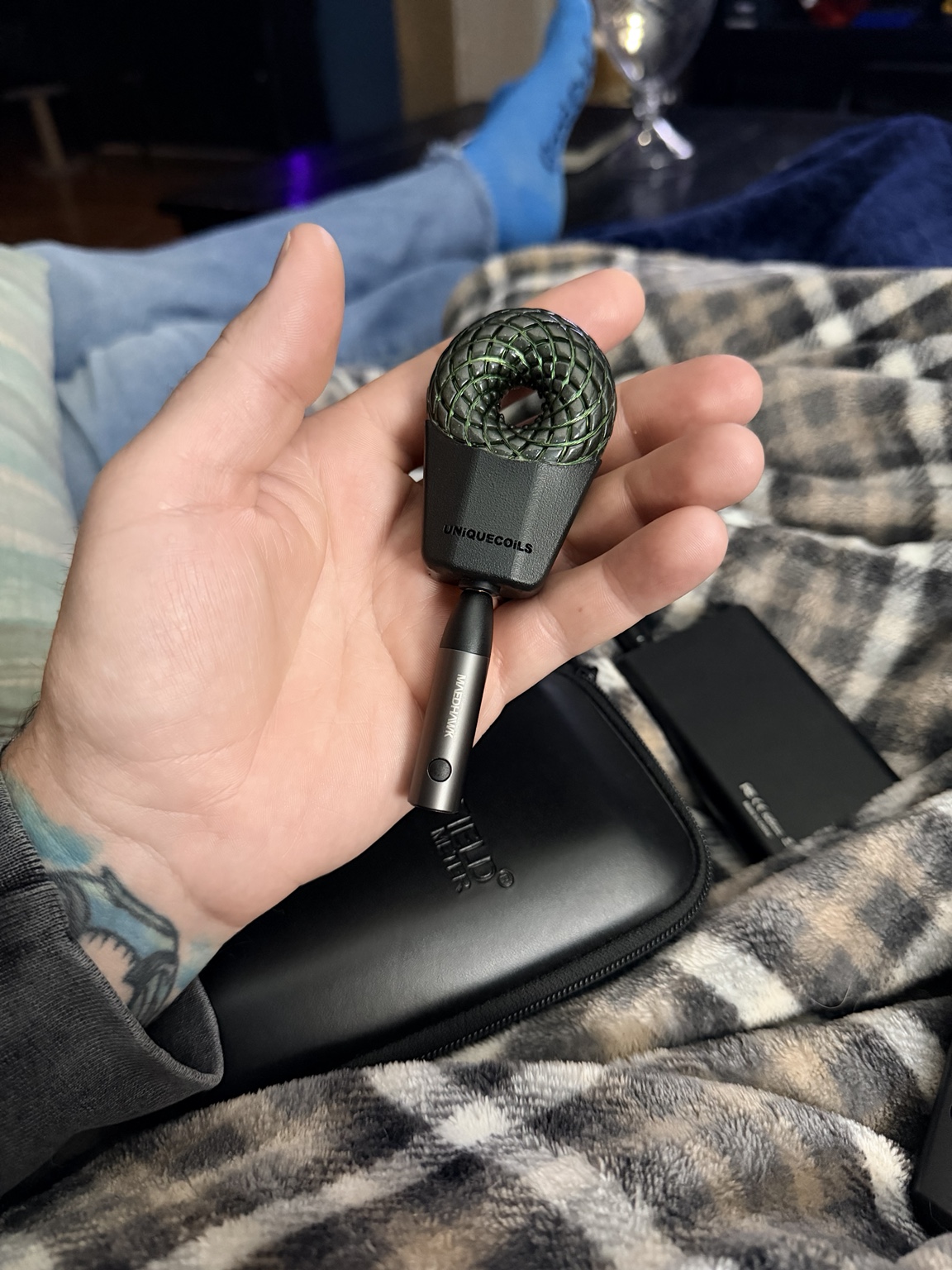 Green pendant in hand